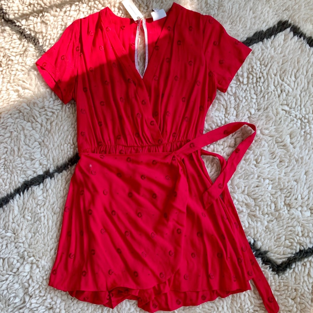 Pink romper from Anthropologie. New with tags!